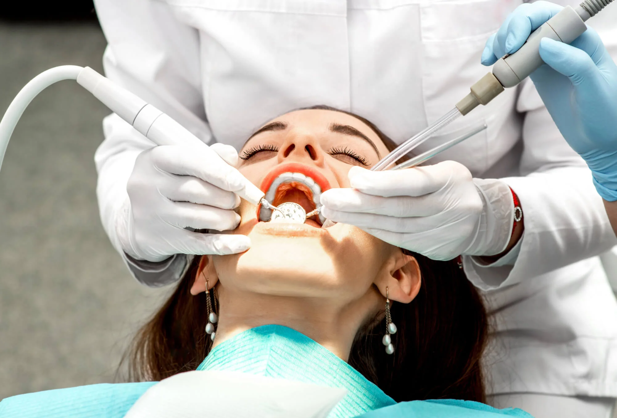 Dental-Hygienist-Performing-Dental-Cleanings-In-Canton-Michigan