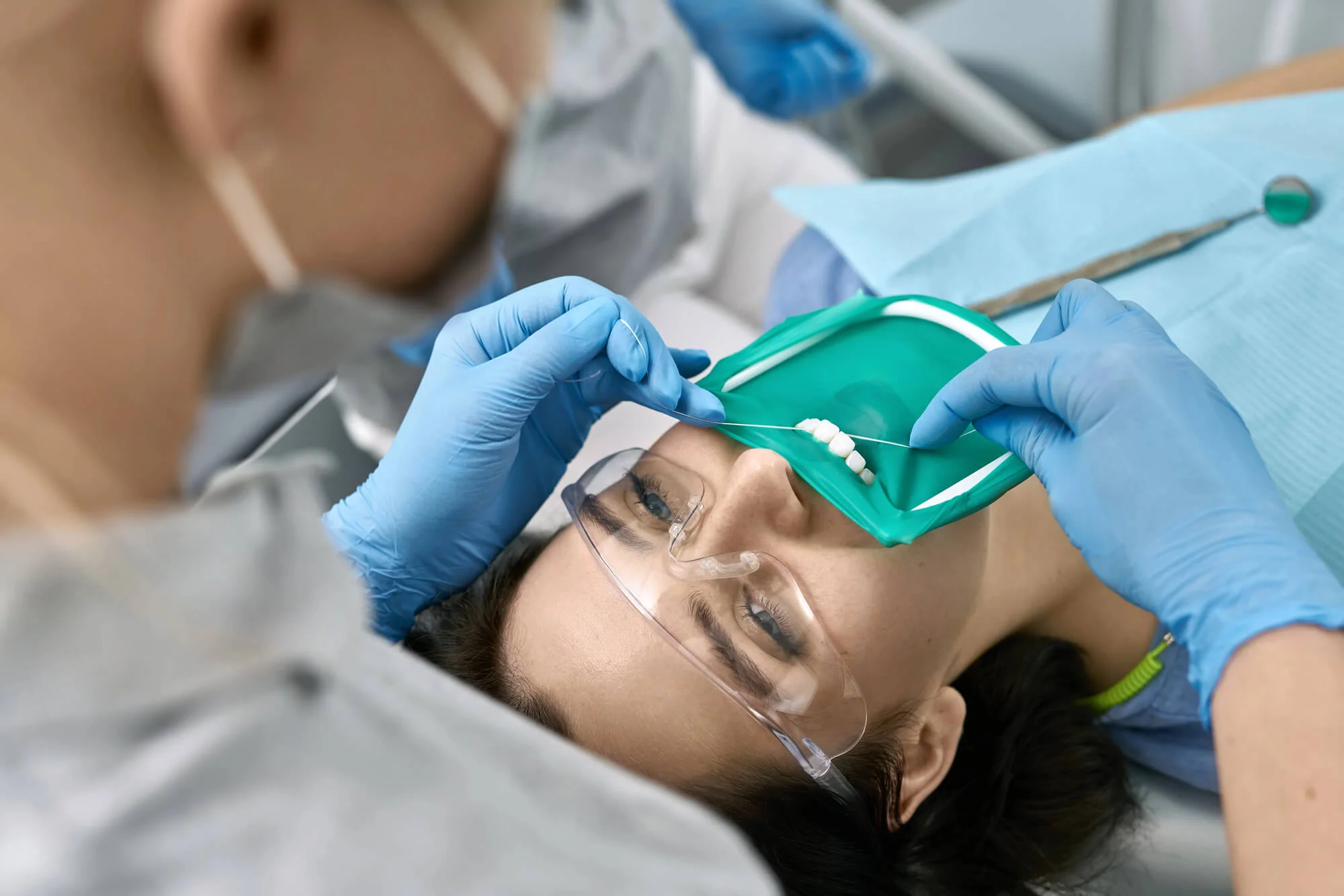 Woman Receiving Professional Dental Cleanings In Canton, Michigan.