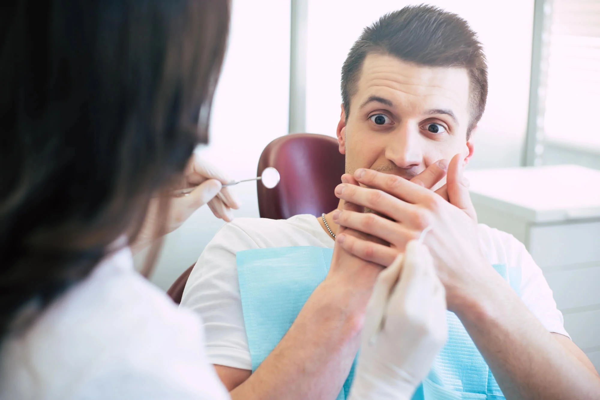 Male-patient-with-dental-anxiety-when-visiting-an-emergency-dentist-in-Canton-MI