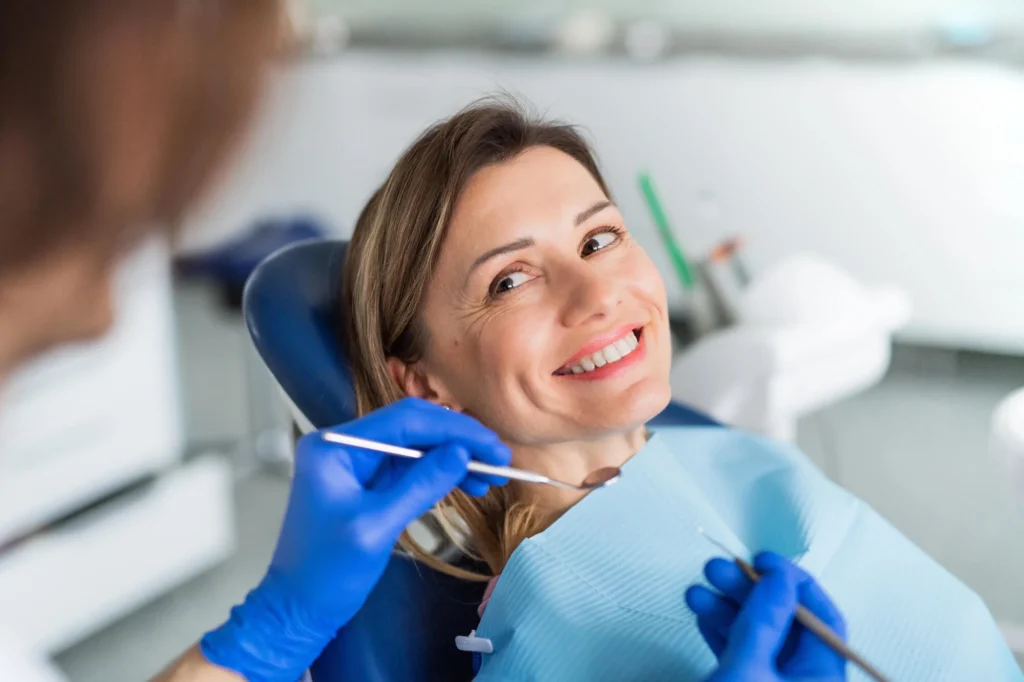Female Patient And Cosmetic Dentist In Canton.
