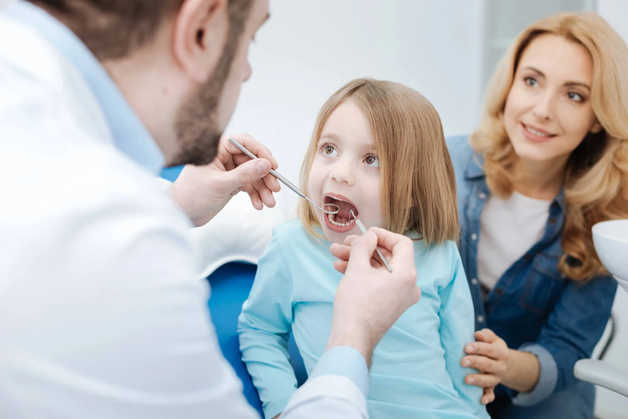 Girl And Her Mom At A Family Dentist In Canton, Mi.